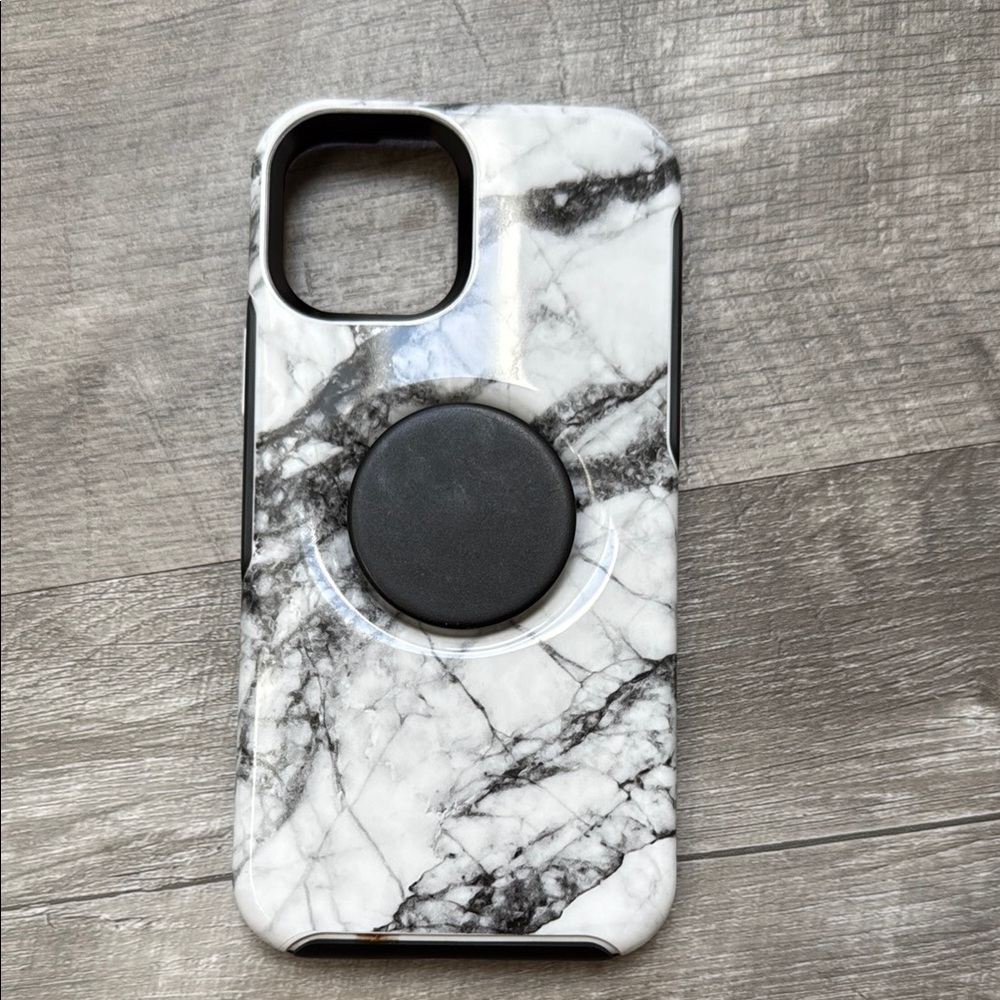 White and Black iPhone 12 Otterbox with build in pop socket